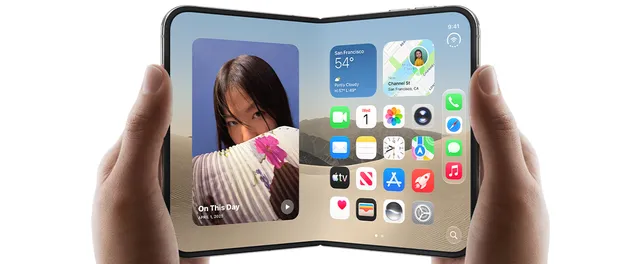 Two hands holding the open Apple iPhone Duo, showing the iOS home screen across the folding display.